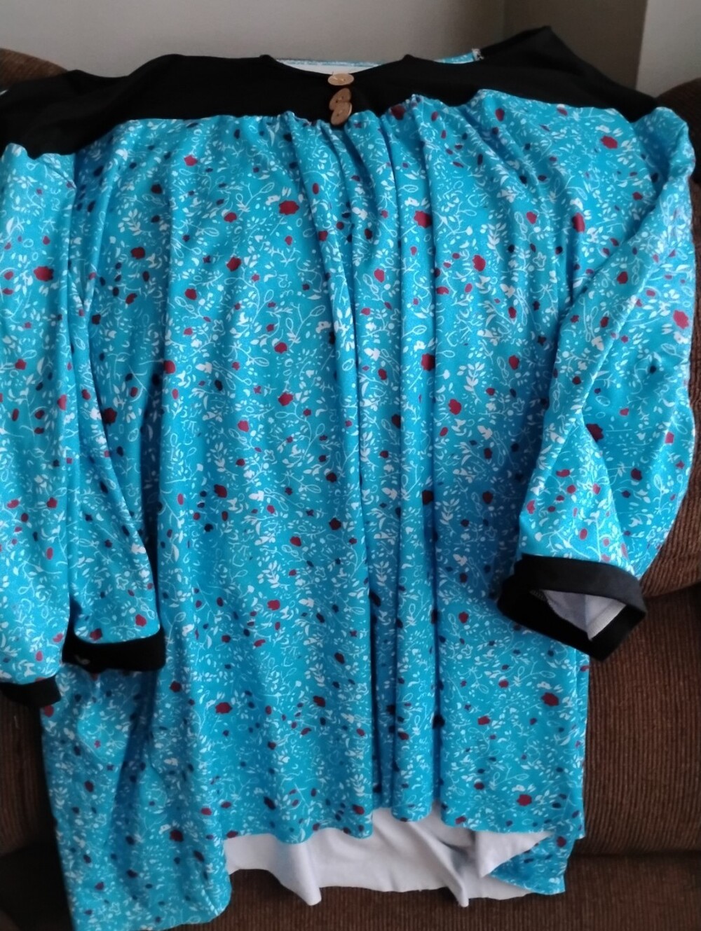 Plus Size Turquoise Floral Button-Accent Tunic Top with Black Trim